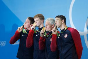 Winnetka’s Conor Dwyer (second from left) is a local Olympian who would benefit from the proposed exemption from paying federal taxes on winnings.  (Photo by Fernando Frazão/Agência Brasil)