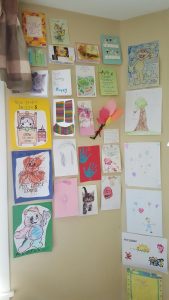 The wall in Clara Nycz’s room at Symphony at the Tillers nursing home in Oswego is decorated with the many cards and drawings she receives from local youth. (Photo by Erika Wurst/For Chronicle Media)