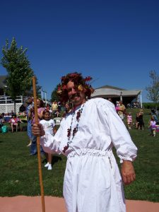 Owner Paul Hahn dressed as Bacchus, the Roman god of wine, at annual Grape Stomp and Harvest Festival held each September at the Mackinaw Vineyard. (Photo courtesy Mackinaw Vineyard)