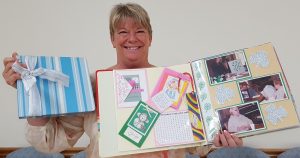 Becky Lueken, Fox Valley Older Adult Services activities and trip director, announces Stampers and Scrap Bookers Sale on Friday, Aug. 12 and Saturday, Aug. 13 at the Fox Valley Community Center, across the street from the Sandwich Fair Grounds, 1406 Suydam Road, Sandwich. (Photo courtesy of Fox Valley Older Adult Services)