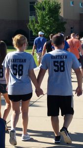 Runners of the Blues on Barton 5K in Oswego on Aug. 6 wore t-shirts memorializing Mark Hartigan, a retired police officer from Oswego who passed away late last month. A portion of the race's proceeds will go to benefit the Hartigan family. (Photo by Erika Wurst/for Chronicle Media) 