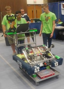 A team maneuvers a robot during the Rock River Off-Season robotics competition on July 30 at Rock Valley College. 