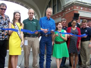 Gov. Bruce Rauner leads the group cutting the ribbon opening the 2016 Illinois State Fair in Springfield on Aug. 12. Newly released figures show that while attendance was down, revenue held or increased compared with 2015 figures. (Photo by Tim Alexander)