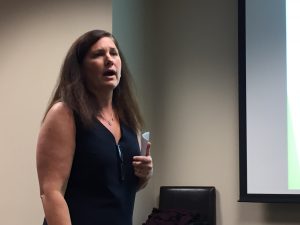 Northern Illinois University business school professor Christine Mooney speaks about social enterprise businesses and impact investing in Chicago Sept. 20. (Chronicle Media) 