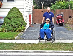  Sandy and Mike Donigain had their driveway blocked off with a curb last summer during street repairs in the 4100 block of Anna Street. (Photo by Jon Langham/for Chronicle Media)