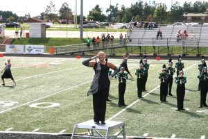 The Eureka High School Hornets stepped off for their first competition of the season at Washington Community High School on Saturday, Sept 10.  The Hornets placed 1st in Class 3A (winning Best Color Guard, Best Percussion, and Best Drum Major) as well as earning the highest overall score for classes 1A-5A. Pictured is Drum Major Emily Wierenga. (Photo courtesy of Eureka H.S. Band)