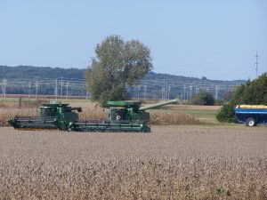 Farm workers in Peoria County take a break during soybean harvesting on October 5. The soybean harvest in Illinois was 16 percent completed at the beginning of the week, according to USDA. (Photo by Tim Alexander)