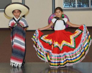 Two young dancers perform at last year's A Celebration of Dance at Kishwaukee College. The college will spotlight Hispanic dance again this year on Oct 13, during Hispanic Heritage Month festivities at the college.
