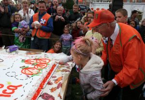 The annual cake cutting ceremony kicks off every Sycamore Pumpkin Festival, as it will for the 55th annual festival Oct. 26. The Sycamore Pumpkin Festival Committee has named local grocer Hy-Vee its Friend of the Festival because of the grocery store's continued support of the cake-cutting ceremony. 