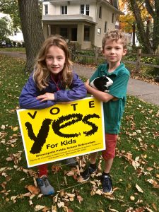 Fifth-grader Samantha Eberly, her third-grade brother Mason and their guinea pig Ginger campaign for strong public schools. 