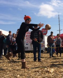 Rock Valley College student, Abigail Roderick, 19, tosses a pumpkin at Morton’s 20th Annual Punkin' Chunkin event Saturday, Oct. 15. Punkin Chuckin' punctuates Morton's annual Pumpkin Festival. Roderick participated in the adult category of the Punkin Toss, and chucked her pumpkin 31.8 feet. (Photo by Holly Eitenmiller / for Chroncile Media) 