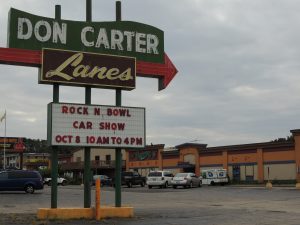 A mix of old and new — The original Don Carter sign points to a new facade on the nearly 60-year-old bowling alley. (Photo by Lynne Conner/for Chronicle Media)