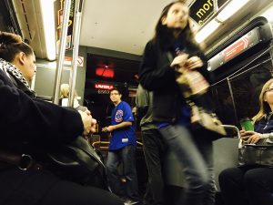 Cubs fan on the Addison bus. (Photo by Karie Angell Luc/for Chronicle Media)