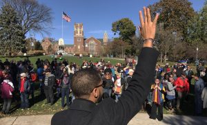 Anthony Clark of Oak Park, founder and director of Suburban Unity Alliance, gets the attention of the crowd to start the program on Nov. 12, 2016 in Oak Park at Scoville Park during the Community for Unity Rally by the Suburban Unity Alliance. (Photo by Karie Angell Luc / for Chronicle Media)
