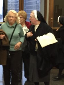 Members of the Missionary Order of St. Charles Borromeo leave the courtroom in Cook Co. chancery Court Jan. 26, 2016. (Chronicle Media) 