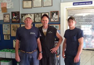 Bill hands today with (from left) son Billy III and grandson Alex at their car-repair shop in Orient, N.Y. 