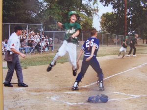A young Ben Zobrist heads for home plate as a youth league baseball player for Eureka Middle School in 1995, a teammate close behind him. The team placed third in the state that year. (Photo courtesy of the Zobrist family) 