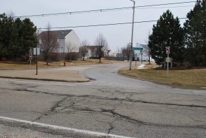 A section of Cedar Lake Road in Round Lake showing its deterioration, which prompted the improvement project going out for construction bid in early 2017. (Photo by Gregory Harutunian/for Chronicle Media) 