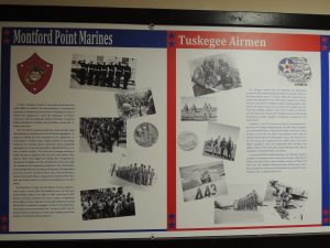 A poster commemorating the Montford Point Marines and the Tuskegee Airmen at VMH. (Photo by Lynne Conner/for Chronicle Media) 