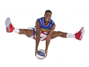 Flip White, from Summit, shows his jumping ability as a member of the Harlem Globetrotters. White is heading into his sixth season with the legendary squad. The Globetrotters will play at 2 and 7 p.m. Dec. 28-29 at the Allstate Arena in Rosemont. (Photo courtesy of the Harlem Globetrotters) 