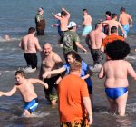 Fundraisers brave frigid Lake Michigan for Special Olympics