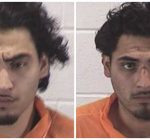 Brothers charged following stand-off with Aurora police