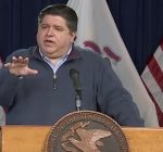 Pritzker warns of long distribution process on vaccines