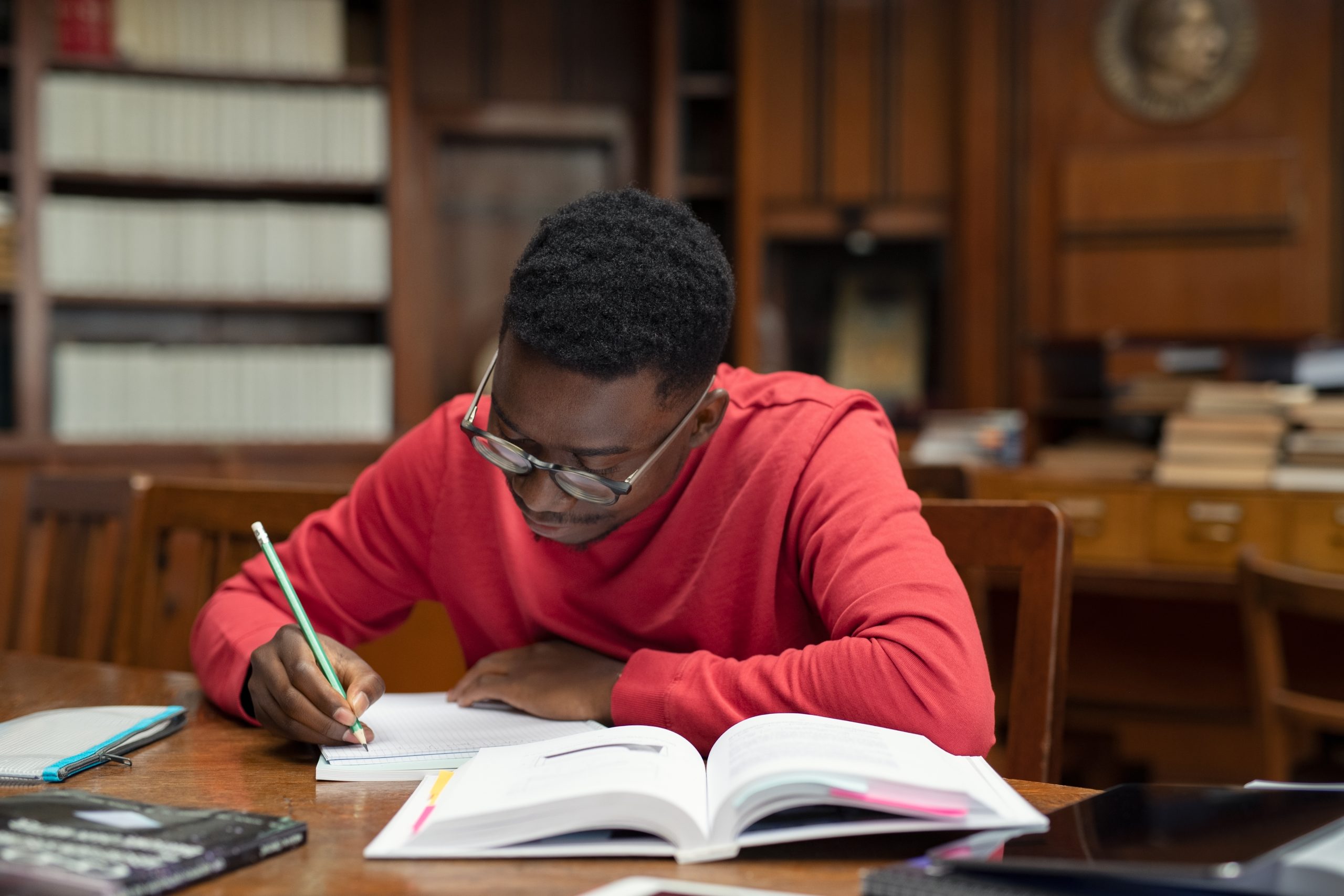 Study person. Person studying. Person study. John is studying the Library. My University studies essay.