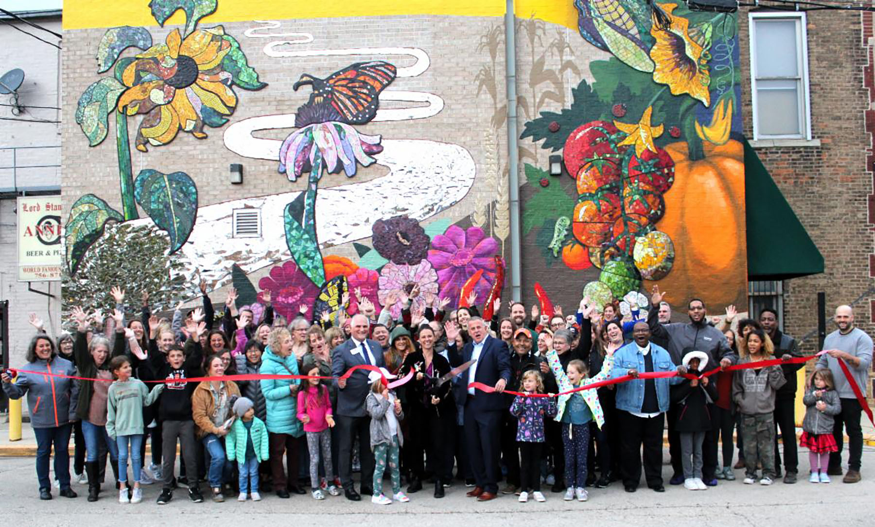 Two-story DeKalb City Hall mural celebrates ‘belonging’ - Chronicle Media